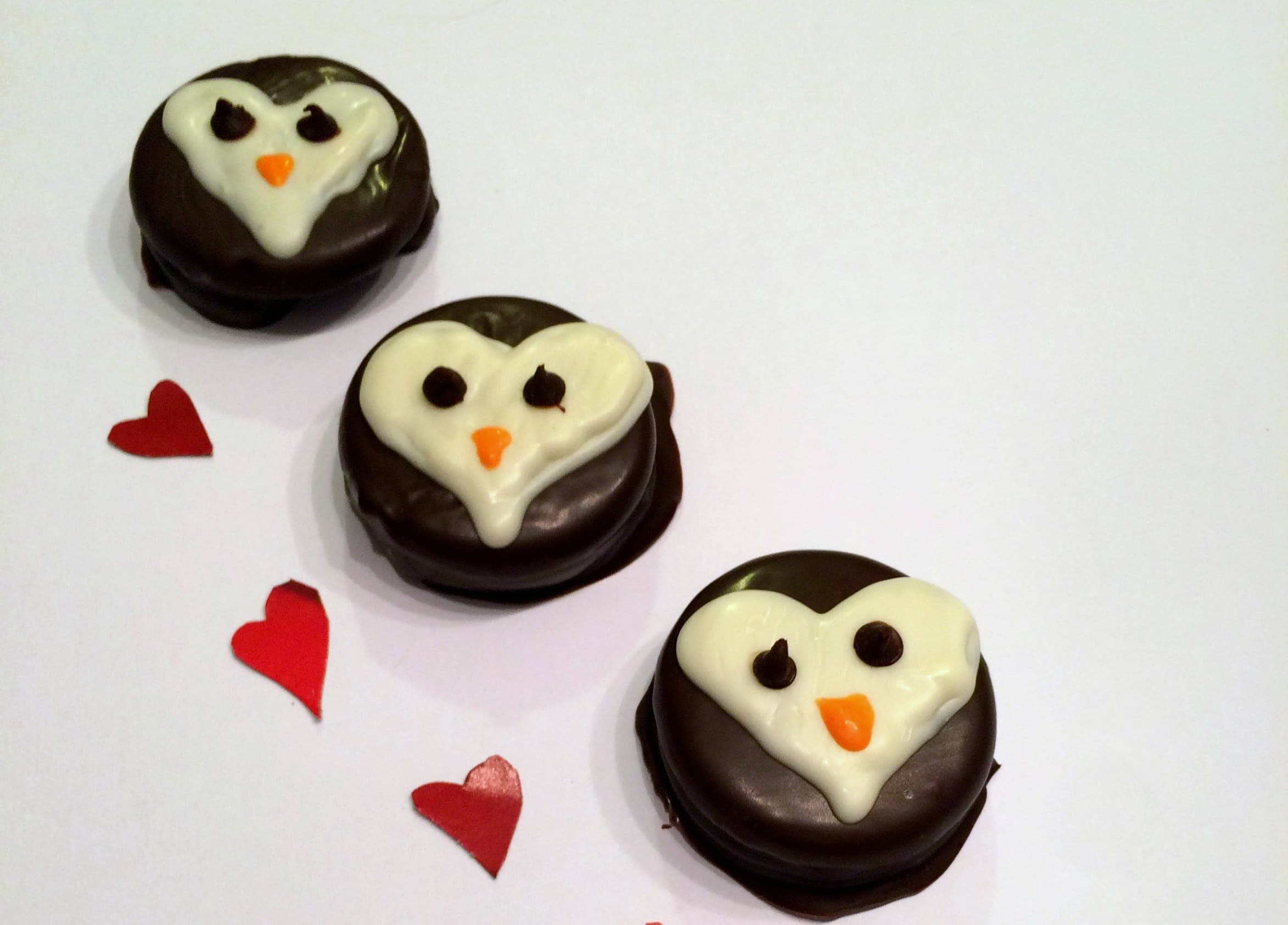 Whether you have a penguin lover in your life, or simply if you're looking for something non-pink or red this Valentine's Day, these penguin heart cookies are so cute! And while they are a little time consuming (covering the Oreos in chocolate), they aren't hard at all!