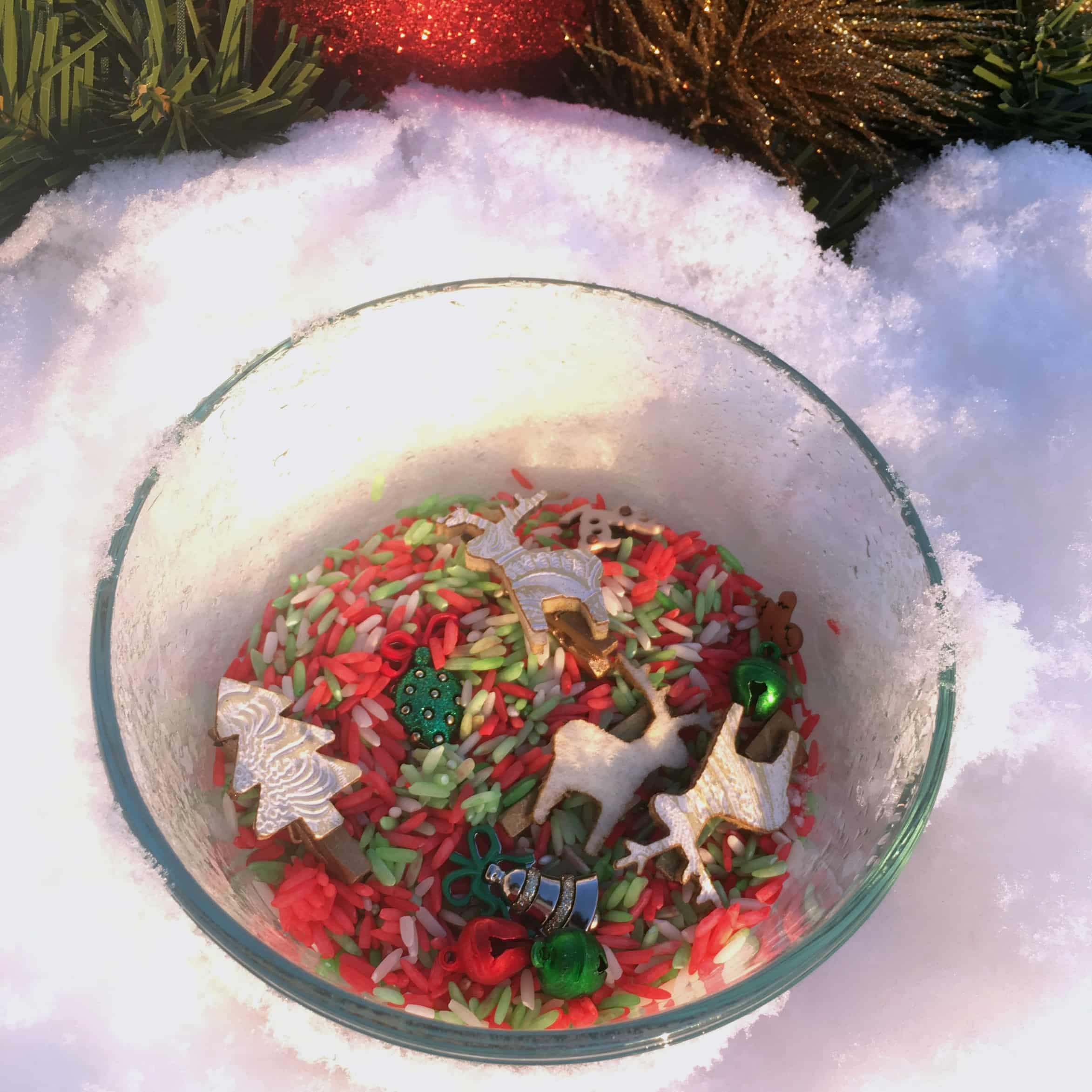 Have fun with a Holiday-themed sensory bin by making coloured rice. Also find out the benefits of sensory play and other simple sensory bin ideas in this Christmas sensory bin post. The recipe is really simple to follow and smells like peppermint! Great for early childhood education, play-based learning, learning through play and more.