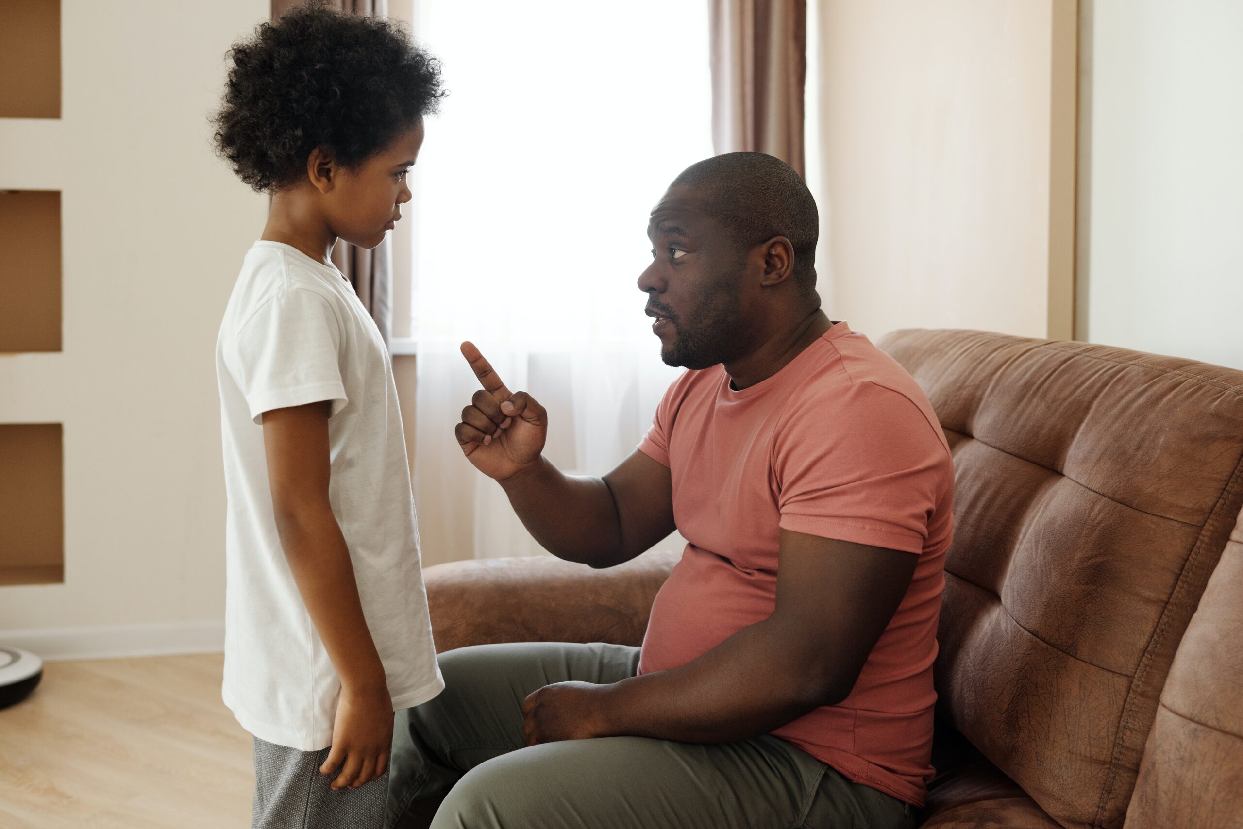 Father is lecturing his son, which causes son to feel reactive and defensive.