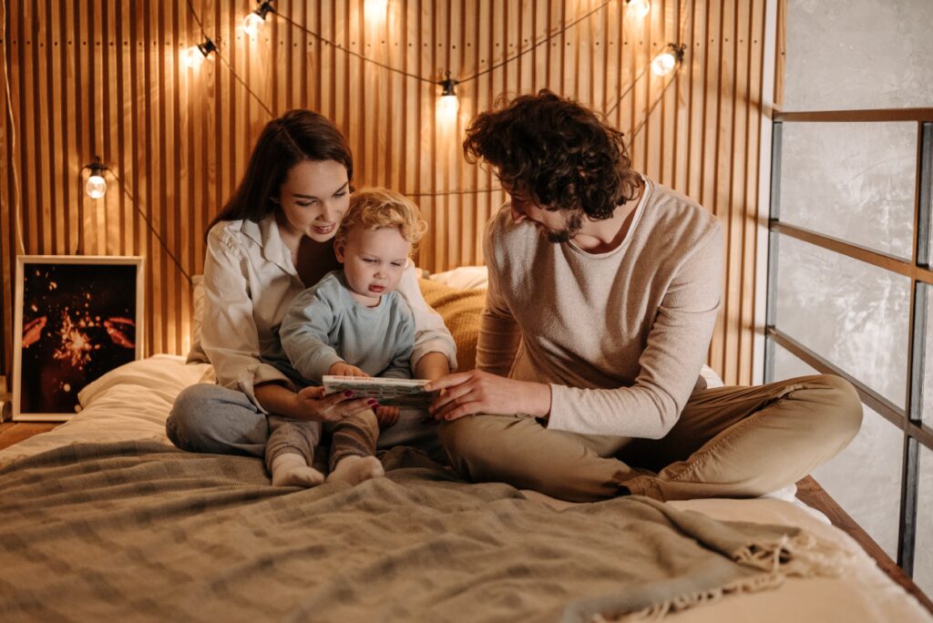 parents reading to a child