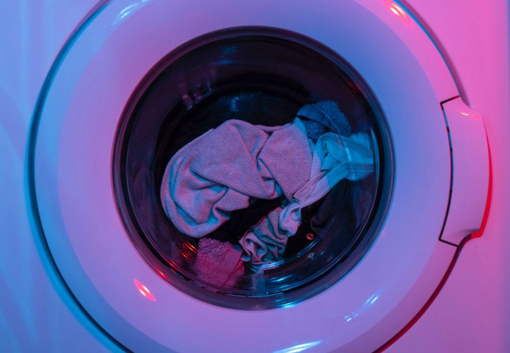 clothes with sticker residue in the washer