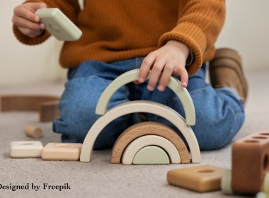 Boy playing with eco toys inside
