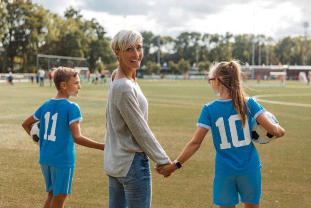 a soccer type of mom with young athletes