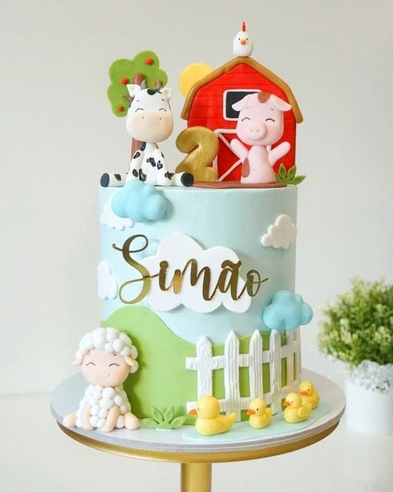 Tall one-layer cake with barnyard theme and design.